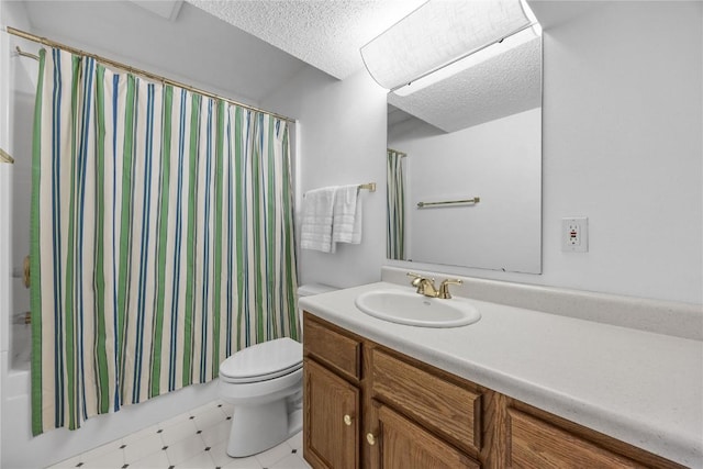 full bathroom with shower / tub combo with curtain, vanity, toilet, and a textured ceiling