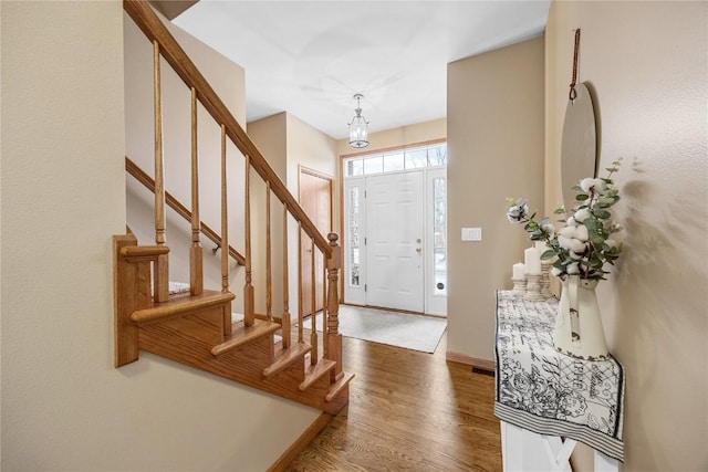 foyer entrance featuring hardwood / wood-style flooring