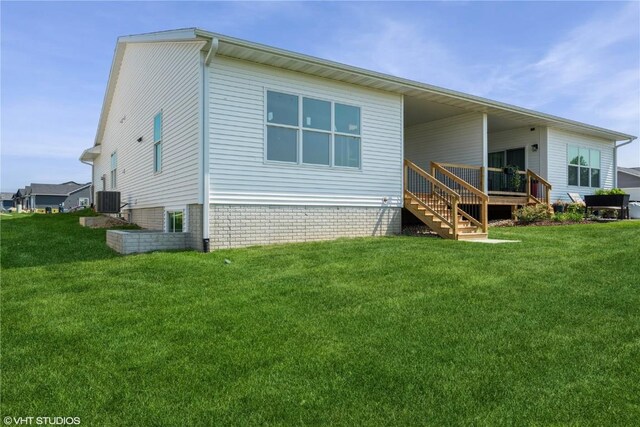 6431 Rookwood Ln, Marion, IA 52302 - rear view of house with a lawn, a deck, and stairs
