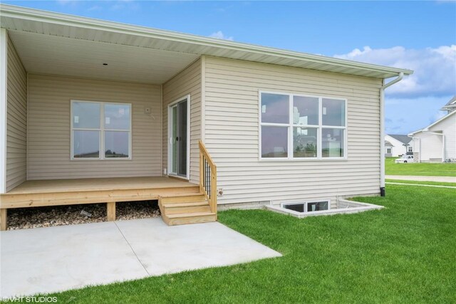 2375 Bluegrass St, Marion, IA 52302 - back of house with a lawn and a patio area
