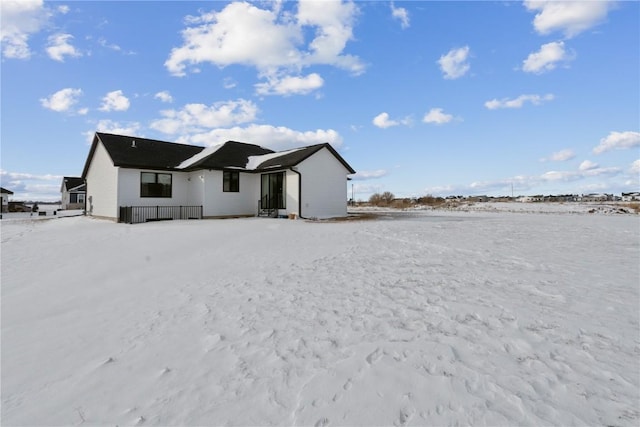 view of snow covered property