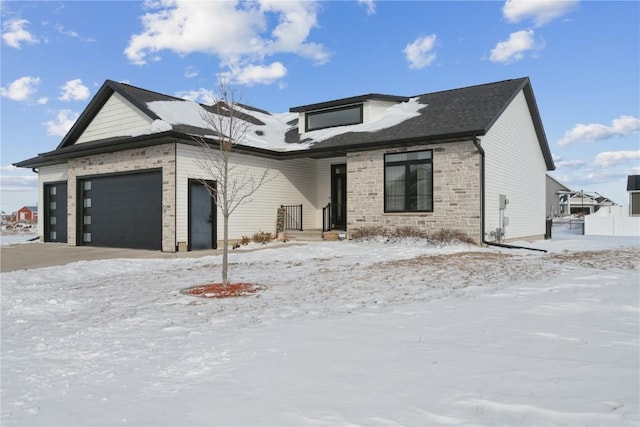 view of front of property featuring a garage