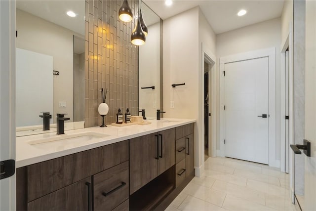 bathroom featuring tile patterned floors and vanity