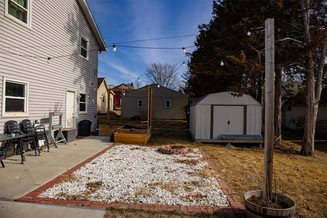 view of yard with a patio area and a shed