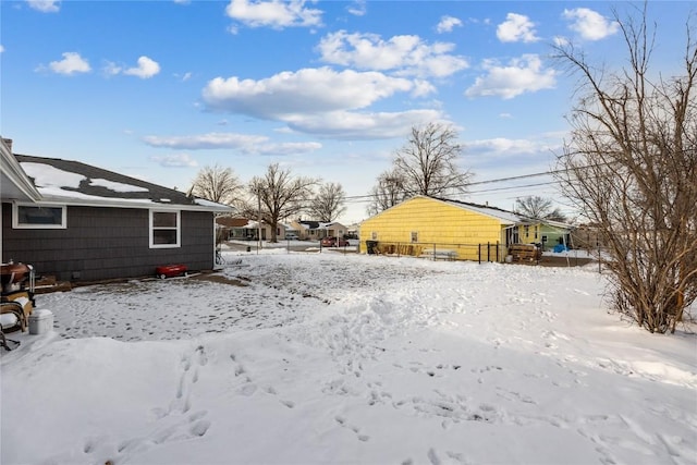 view of yard covered in snow