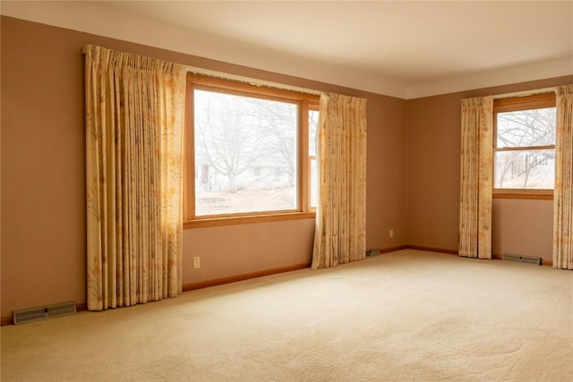 unfurnished room with carpet