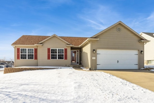 ranch-style house featuring a garage