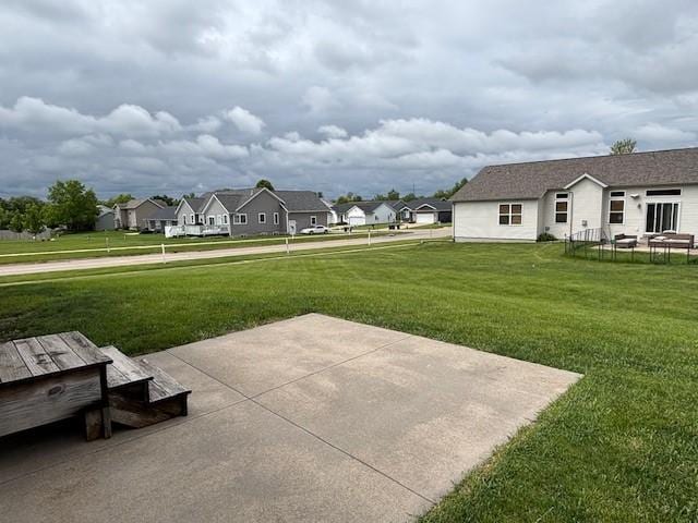 2010 Agate St, Marion, IA 52302 - view of grassy yard with a patio and a residential view