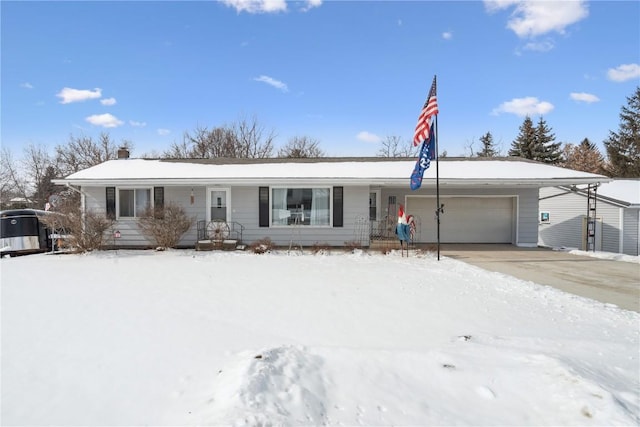 ranch-style home with a garage and a carport