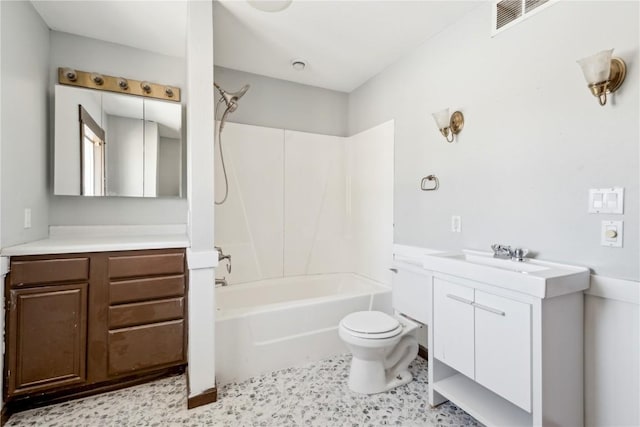 full bathroom featuring two vanities, visible vents, toilet, tub / shower combination, and a sink