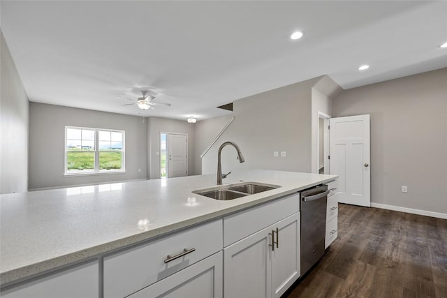 628 Catherine Dr, Tiffin, IA 52340 - kitchen with dishwasher, dark wood-style floors, light stone countertops, white cabinetry, and a sink