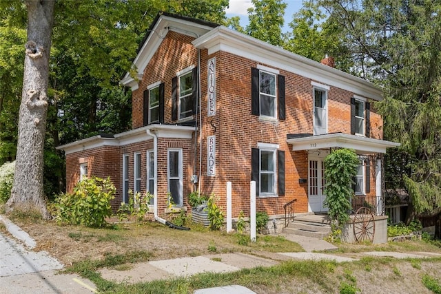 view of front of property with brick siding