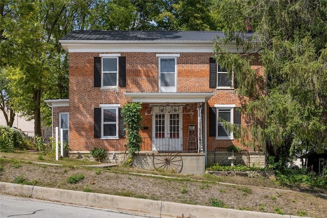 view of front facade featuring brick siding