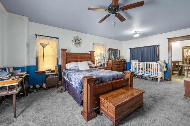 230 E Market St, Lisbon, IA 52253 - carpeted bedroom with crown molding and ceiling fan