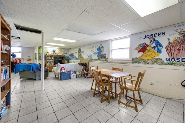 230 E Market St, Lisbon, IA 52253 - dining area featuring light tile patterned floors and a drop ceiling