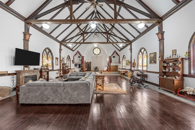 230 E Market St, Lisbon, IA 52253 - living area with a warm lit fireplace and wood finished floors