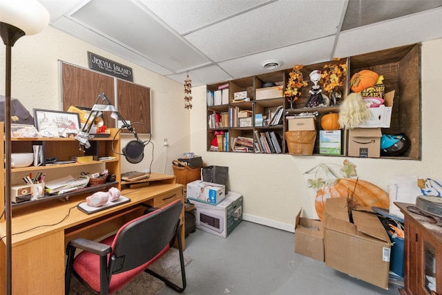 230 E Market St, Lisbon, IA 52253 - office area with a paneled ceiling, concrete floors, and visible vents