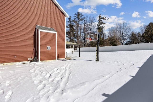 view of yard layered in snow