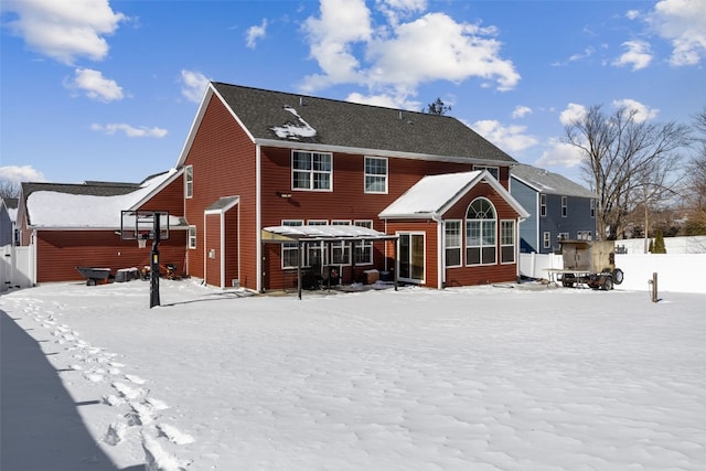 view of snow covered house