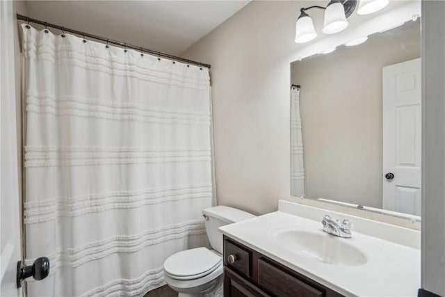 full bathroom with vanity and toilet