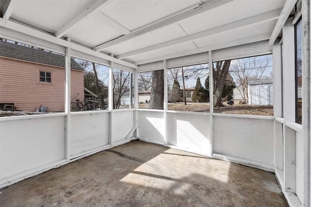 unfurnished sunroom featuring a wealth of natural light