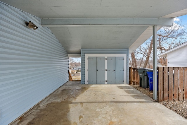 view of exterior entry with fence