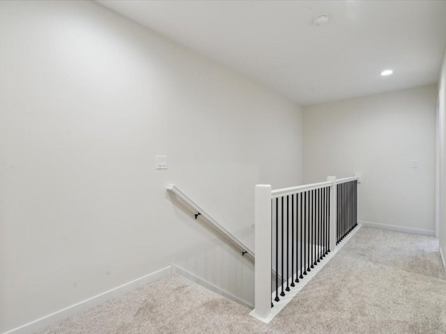 stairs featuring recessed lighting, carpet flooring, and baseboards