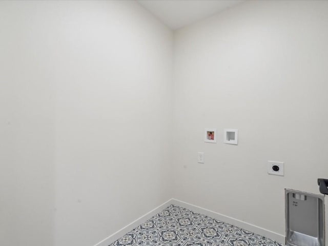 clothes washing area featuring laundry area, hookup for a washing machine, baseboards, and hookup for an electric dryer