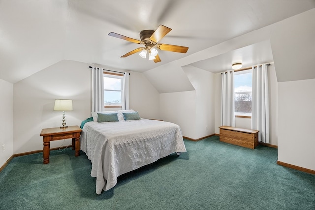 carpeted bedroom with lofted ceiling, multiple windows, and baseboards