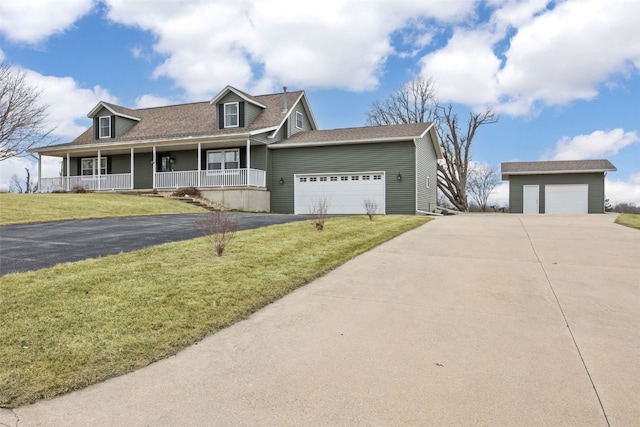 view of front of home with covered porch, a garage, a shingled roof, driveway, and a front yard