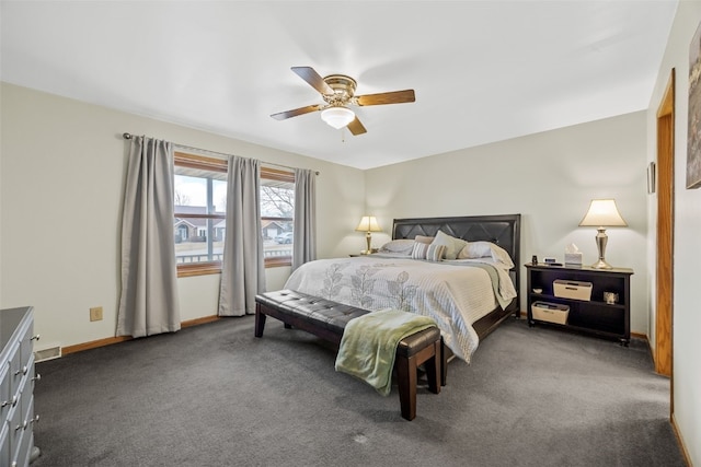 carpeted bedroom featuring ceiling fan and baseboards