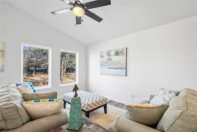 living room with vaulted ceiling, ceiling fan, and wood finished floors