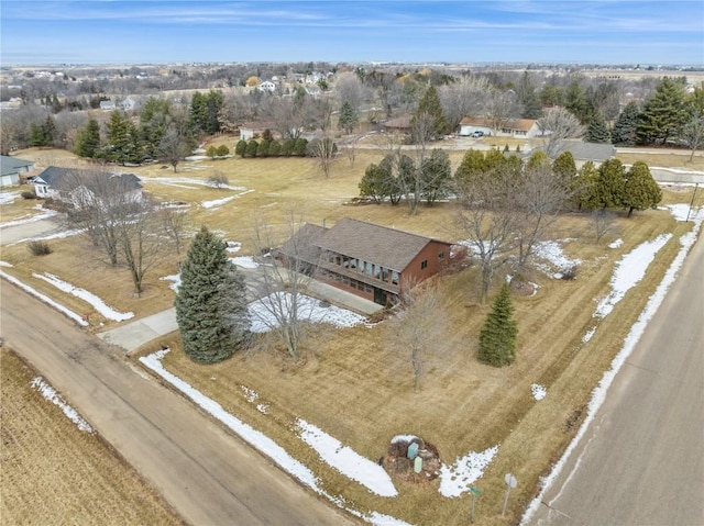 birds eye view of property with a rural view