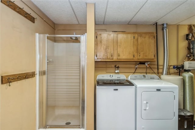 laundry room featuring cabinet space and independent washer and dryer