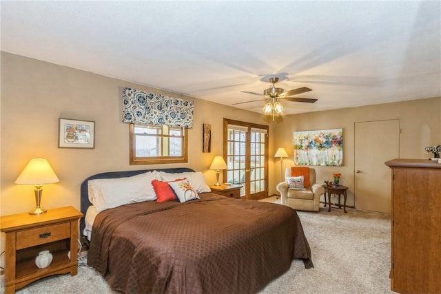 bedroom featuring french doors, carpet floors, and ceiling fan