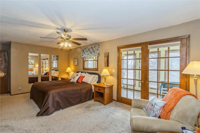 carpeted bedroom with ceiling fan, french doors, and baseboards