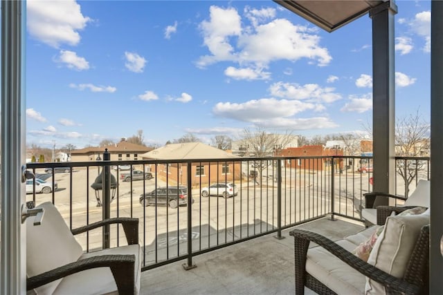 balcony featuring a residential view