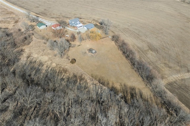 birds eye view of property featuring a rural view