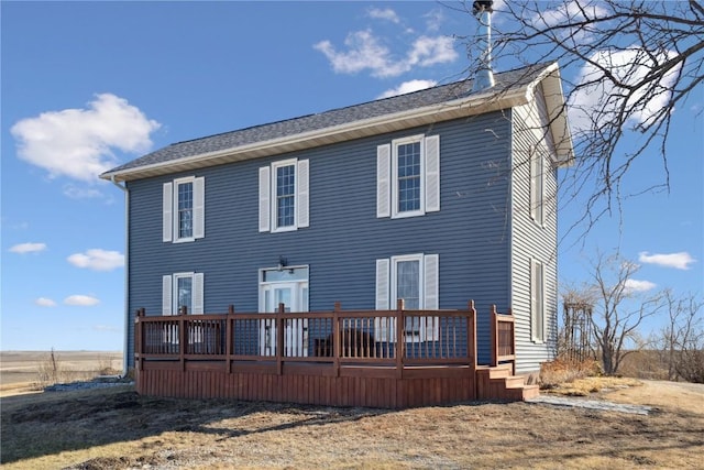 view of front of property with a deck