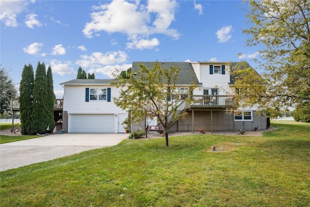 view of front of house featuring concrete driveway, a front lawn, stairway, and an attached garage