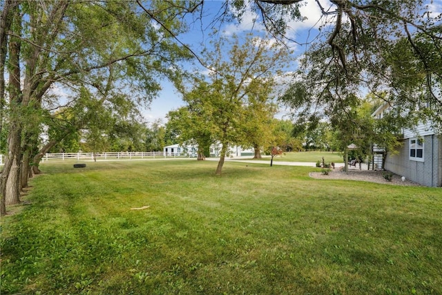 view of yard with fence