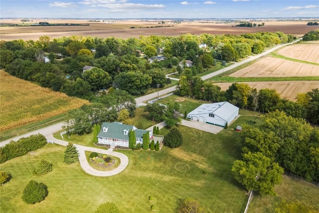 birds eye view of property featuring a rural view