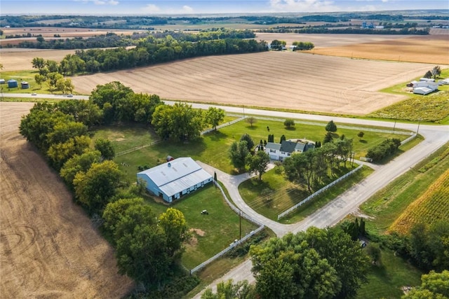 birds eye view of property with a rural view