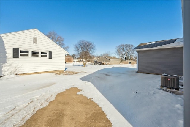 exterior space featuring an outbuilding and central AC unit