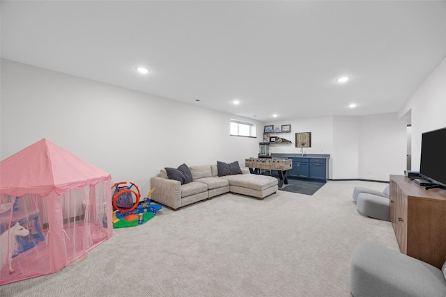 living room featuring carpet floors and recessed lighting