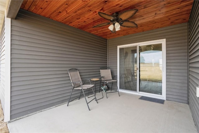 view of patio featuring a ceiling fan