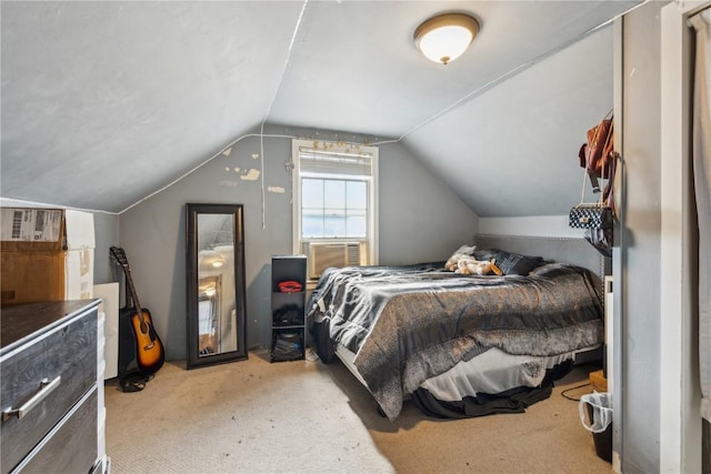 carpeted bedroom featuring lofted ceiling