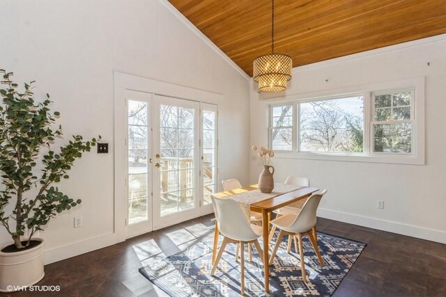 dining area featuring wood ceiling, baseboards, vaulted ceiling, and french doors