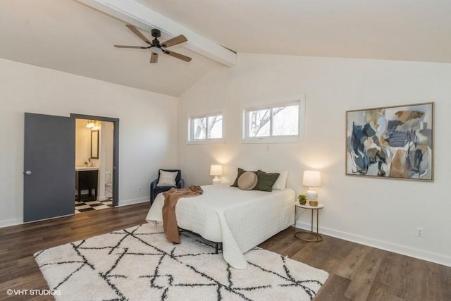 bedroom featuring lofted ceiling with beams, baseboards, and wood finished floors