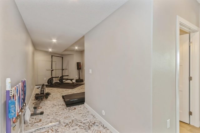 workout area with baseboards